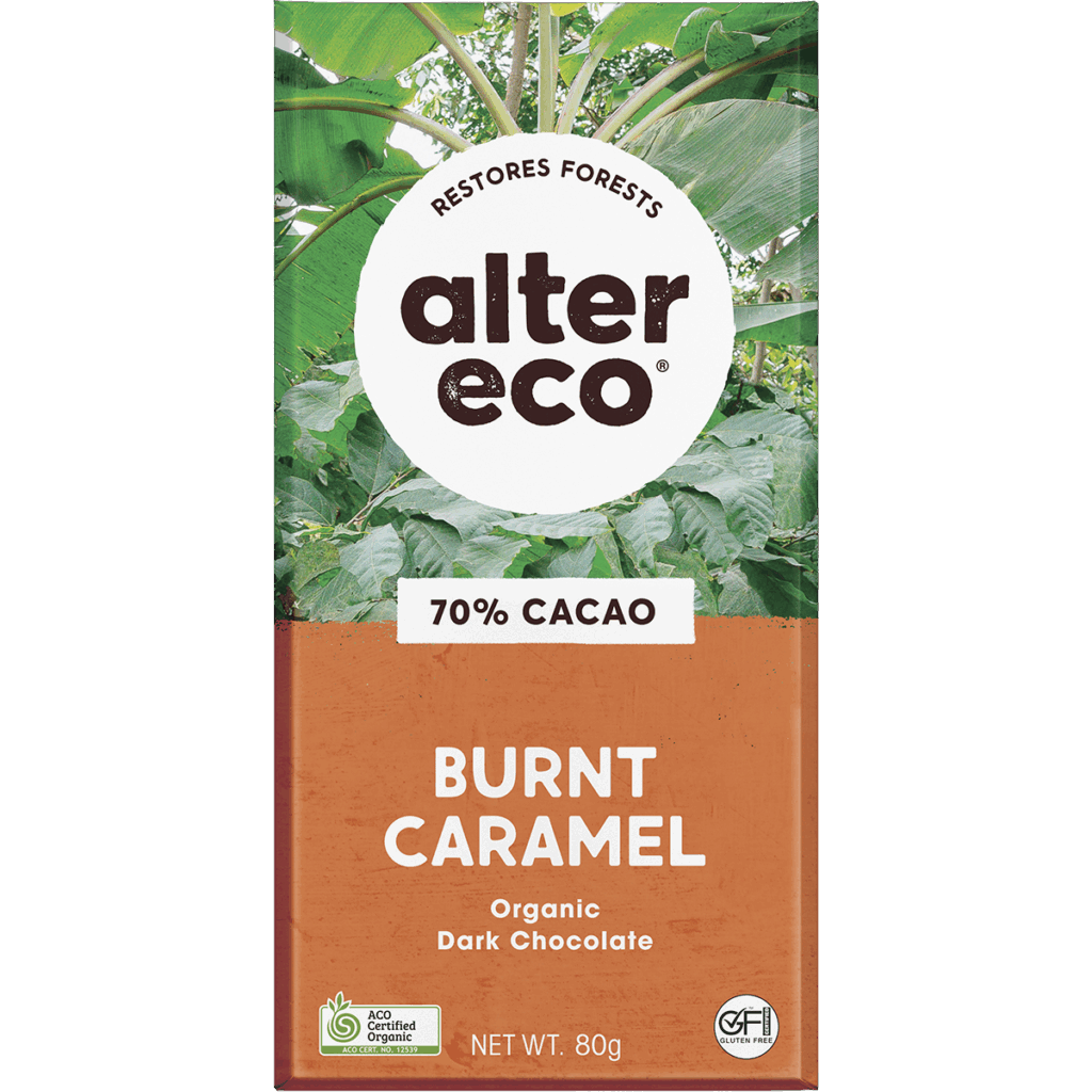 A bar labeled "Chocolate Organic Dark Burnt Caramel - 80g" is shown with jungle foliage in the background.