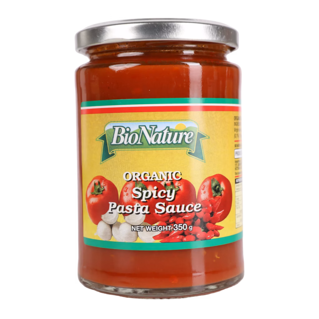 A 350g jar of Organic Spicy Pasta Sauce with a yellow label featuring tomatoes, garlic, and chili peppers.